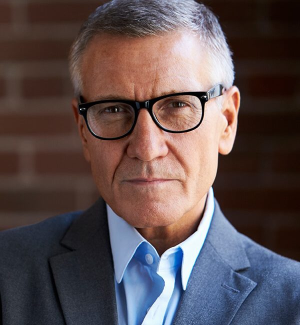 head-and-shoulders-portrait-of-mature-businessman-PXMKX9B.jpg